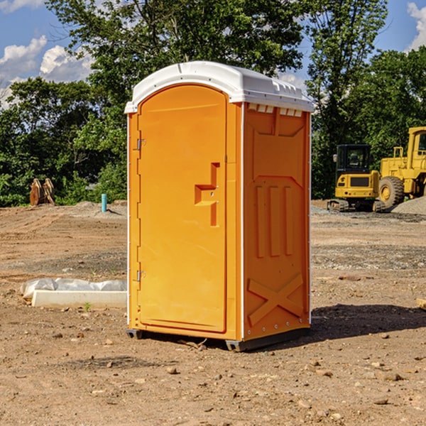 what is the cost difference between standard and deluxe porta potty rentals in New Castle